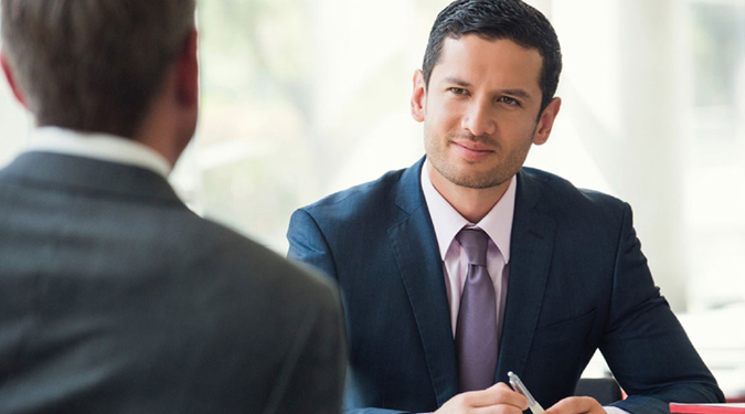 Commercial real estate banker and construction manager on commercial property site Commercial real estate banker and construction manager on commercial property site