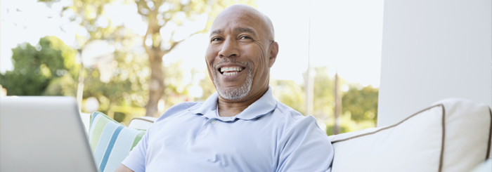 Senior male smiling outdoors Senior male smiling outdoors