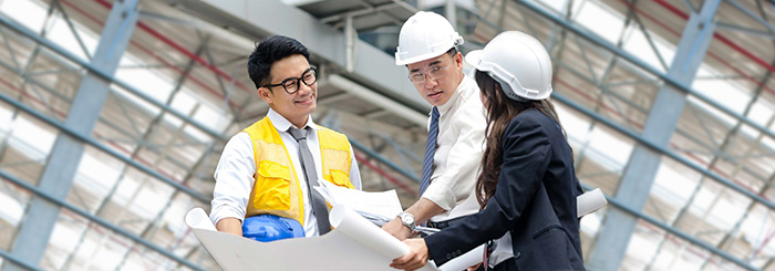 Construction finance team on commercial property site Construction finance team on commercial property site